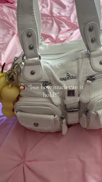 how much can an angel kiss bag hold? i got you! #angelkiss #purse #angelkissbag @Angelkiss Bags 