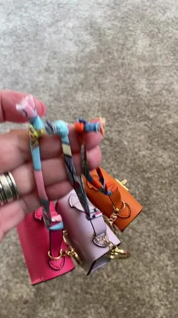 These purse charm pouches are cute and convenient! #PurseCharm #PocketPurseCharm #PouchPurseCharm #MiniCoinPurse #purseclip @Aouerbeng 
