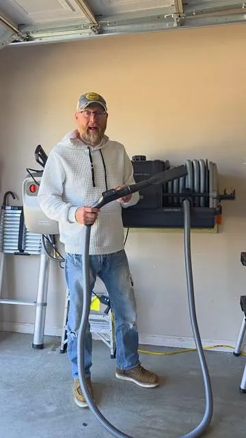 giraffe tools wall mounted retractable vacuum system.#vacuumcleaner #wallmount #tiktokmademebuyit #genx #tiktokshopcreatorpicks 