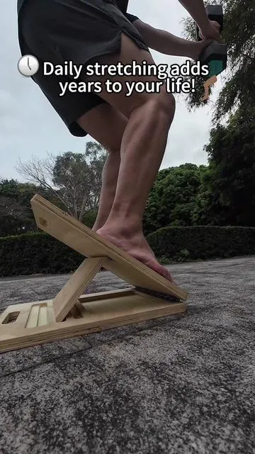Experiencing body aches after 40? It's time for targeted stretching! Let this board fix your troubles!  🙏🦵#slantboard #PainRelief #longevity #legstretch #kneepainrelief 