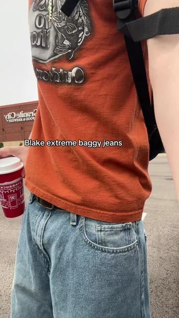 Clean and tuff medium blue jeans, for any outfit #baggyjeans #jeans #streetwear #streetfashion #mensoutfitideas 