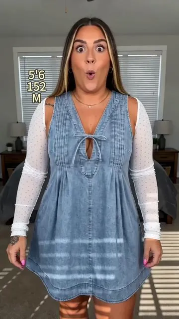 POV: You found the perfect denim dress for your curves. 🦋✨ The A-line fit is so flattering and that front tie detail? Perfection. 💎 Run to the yellow cart before these sell out! 🛒🏃‍♀️ #dresswithpockets #curvystyle #midsizequeens #summeroutfit #fashionfind