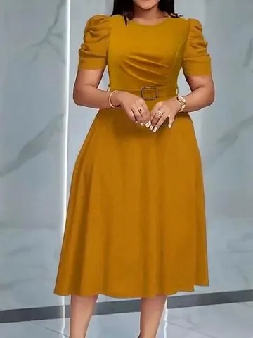 This is a yellowish-golden round-neck  fitted A-line mid-length dress, featuring a professional and elegant business office style. With simple and neat cutting and warm tones, it creates a sophisticated and elegant appearance, making it a versatile piece for both workplace and light-formal occasions.
Round neck + Bubble short sleeves： The classic round neck enhances the neck line， paired with retro bubble short sleeves， which can hide arm fat while creating a soft shoulder line， exuding an elegant vibe.
Waist side pleats + Metal buckle belt: The waist side is designed with diagonal pleats, naturally tightening the waistline and optimizing the body proportion； paired with the same color belt + square metal buckle， it further emphasizes the high waistline and adds more layering to the look.
A-line wide skirt： The lower body adopts an A-shaped silhouette, flowing naturally from the waist, with a knee-length length, which can effectively correct hip width and leg thickness issues, and is very friendly to pear-shaped and slightly overweight figures.
Drape and anti-wrinkle fabric： The fabric is stiff and stylish， with excellent drape， not prone to wrinkling， easy to care for， suitable for daily commuting wear； it also has a matte texture， being low-key yet elegant.
Yellowish-golden tone： Warm yellowish-golden color doesn't pick on skin tones， even those with yellow skin can easily handle it， exuding a gentle and sophisticated vibe， brighter than basic black and white， yet not overly张扬.
Style positioning： Business office style， light and mature elegant style， simple and sophisticated style， essential for working women.
Applicable scenarios： Daily commuting， business meetings， interviews， light-formal gatherings， afternoon tea， etc. One dress can be worn in multiple ways， suitable for various occasions.
Slimming effect is maximized： Pleats at the waist + A-line wide skirt， dual modification of the figure， concealing fat and slimming， instantly transforming into a three-quarter figure
Versatile and practical： Simple and elegant design， suitable for pairing with suits， windbreakers， cardigans， etc.， adaptable to various dressing styles
High-quality texture： Drape fabric + matte color， low-key and eye-catching， looks good even when worn daily
Wide scene adaptation： Can be worn in the workplace， daily life， light-formal occasions， etc.， with high practicality #Summer #women's #clothing #Business #casual #A-line #mid-length #dress #Office #outfit #Sophisticated #style #slimming #Waist #crease #for #shaping #the #waist #A-shaped #wide #hem #covering #hips #Gentle #attire #Professional #OL #Slimming #and #concealing #figure #model #Simple #elegant