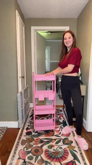 This rolling storage cart is actually big enough to fit tall things! #RollingCart #HomeOrganization #OrganizationHacks #HomeEssentials #CleanHomeReset 