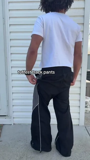 Finna be wearing track pants all summer long  #trackpants #menspants #streetfashion #summeroutfits #fashioninspo 