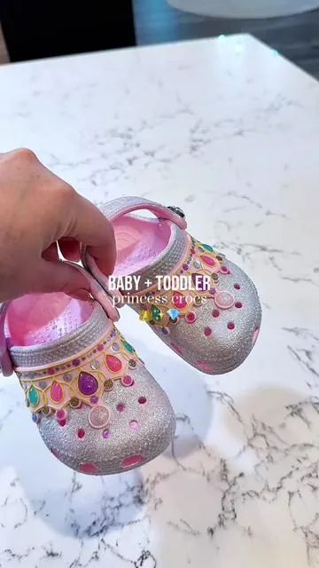 Love these adorable crocs for babies and toddler; they have designs for boys and girls but I love these baby girl crocs! #girlmoms #crocs #toddlershoes #babyshoes #tiktokshopcreatorpicks @Crocs 