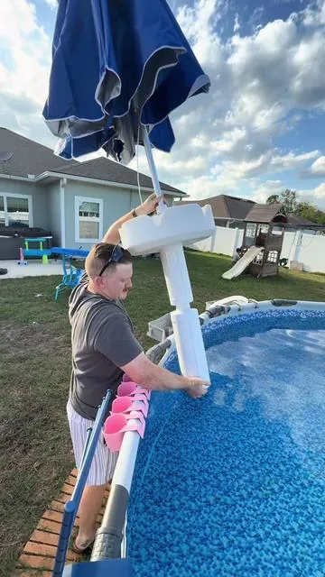 This floating table umbrella is the ultimate pool upgrade—you get built-in shade plus a full table setup with 6 cup holders so everything stays right within reach. so you can keep drinks, snacks, even your phone nearby without constantly getting out. It basically turns your pool into a swim-up lounge—shade above you, drinks beside you, and zero effort. Systems like this are designed to float with you while keeping everything balanced and accessible, which is why they’ve become such a go-to for relaxing and hosting in the water   ##PoolUmbrella##FloatingTable##PoolUpgrade##tiktokshopstockup##tiktokshopmothersday floating pool table umbrella pool umbrella with cup holders floating pool bar table pool drink holder with umbrella tiktok pool setup