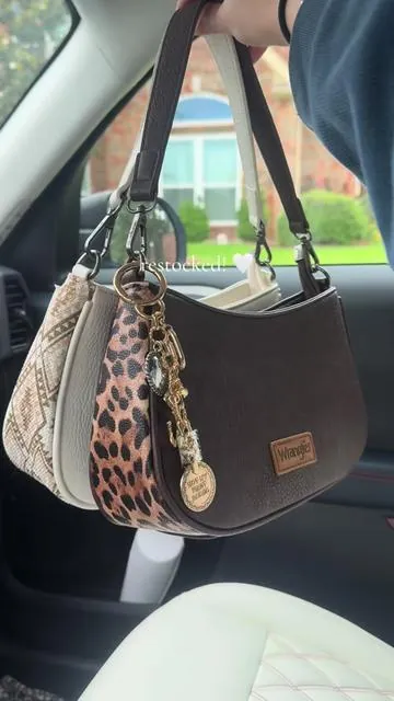 both these colors are currently in stock! 🤎@Rustic Charm Bootic #wrangler #shoulderbag #purse #wranglerpurse #westernfashion 