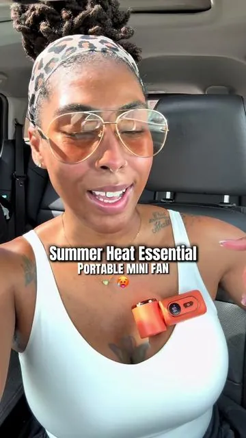 Ok NOW I get the hype because being able to clip this fan onto your shirt or purse strap completely changes everything! 🙌🏾 The head swivels so you can point the airflow directly at your face and keep your hands free while you’re out in the heat. Game changer! And it’s on sale right now? Yeah, don’t wait on this one. 🏃🏾‍♀️💨 #portablefan #summervibes #summeressentials #tiktokshopstockup #tiktokshopmothersday 