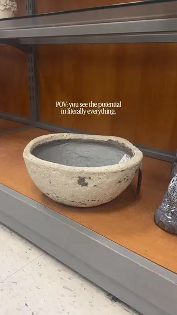If you’re the type who sees potential in everything… this one’s for you 🤍 I’ve been wanting a backyard fountain forever but didn’t want the price tag, so I made my own DIY fountain and I’m obsessed with how calming it makes our patio feel. The water sound, the cozy vibe, the instant upgrade… 10/10 recommend trying!  This is proof you don’t need a huge budget to create a relaxing outdoor oasis. A few simple supplies + a little creativity = the easiest patio upgrade ever. Save this for your next DIY outdoor project ✨ My exact planter is from @TJ Maxx  Solar fountain is linked!  #diyfountain #solarfountain #fyp #homedecor #BackyardDIY 