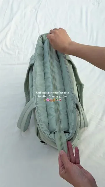 I’m officially done gatekeeping the perfect tote for my 40oz Stanley girlies.   You know the struggle of finding a bag that actually fits the big bottle without tipping over... well, she is THE ONE.  The interior space is insane, the pockets are perfection, and can we talk about these cute linings?!   Which color are we obsessed with?  #totebag #workbag #collegebag #schoolbag #stanleycup #40ozstanley #whatsinmybag #organizedbag #aestheticstyle #bagtour #musthaves #newfinds #emotionalsupportwaterbottle