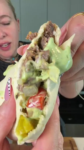 Healthy, high protein steak fajitas!  1 lb flank steak or any cut, sliced into strips  Marinade- 3 Tbsp olive oil  4 Tbsp soy sauce  1 tsp black pepper  1 lime-juiced  Marinate for 10-15min  1 large onion -sliced  2 bell peppers -sliced  Avocado crema- 1 cup Greek yogurt  1 lime-juiced  1 avocado  1/3 cup cilantro  Salt to taste  Pepper to taste  Water as needed for consistency  #steakfajitas #fajitas #healthydinner #highproteinmeals #highproteindinner 