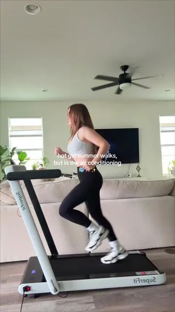 Ain’t no way I’m doing my 10k steps outside in the summer 🥵😂 #walkingpad #walkingpadathome #walkingpadtreadmill #treadmill #hotgirlwalks 