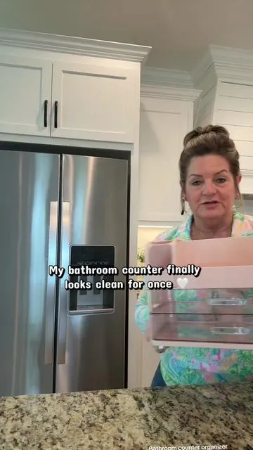 If your bathroom counter stays cluttered, this organizer makes everything look neat and easy to grab without taking up a ton of space. #bathroomorganizer #makeuporganizer #bathroomdecor #homeorganization #vanitysetup