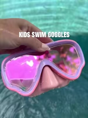 These kids swim goggles are actually SO good for summer 😭 The fabric strap doesn’t pull hair, they stay comfortable, and they’re leak proof too. Perfect for swim lessons, pool days, and summer vacation ☀️.              #kidsswimgoggles #swimgoggles #summeressentials #poolday #momtok