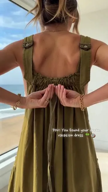 Honestly, I am never taking this off. This army green maxi gives the perfect beachy, relaxed vibe. The back detail is everything, and we love a dress that actually holds all your stuff in these giant pockets. 🌊✨ #fyp #SummerVibes #ootdinspo #vacationoutfit #summerdresses 