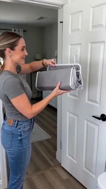Tired of clutter taking over your space? This Over-the-Door Hanging Storage Box is your new best friend! ✨ With 4 tiers and large pockets, it’s perfect for organizing bedrooms, bathrooms, or even your pantry. It's a compact, sturdy, and lightweight solution to keep everything tidy. Transform your home with this functional space-saver. Tap to shop and get organized! #fyp #homeorganization #spacesaving #storagehacks #AIGC #Moras