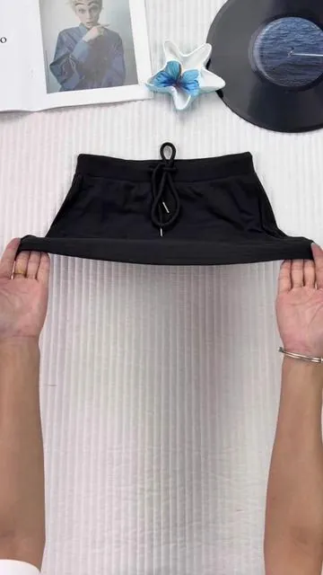 The exterior is a flirty skirt, while the inside is a comfortable pant.#skirtpants #builtinshorts #lowwaist #dealsforyoudays #summervibe 