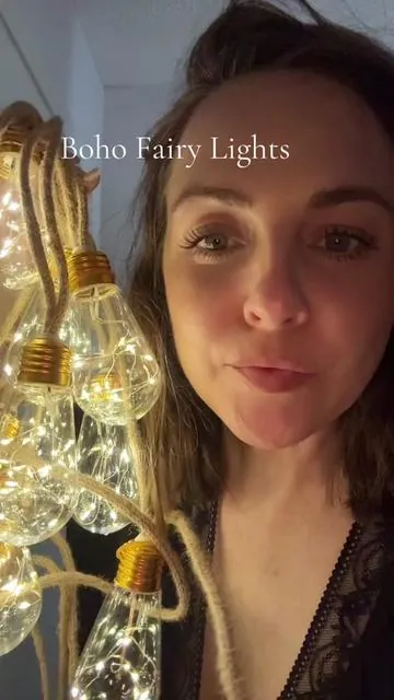 BoHo ferry string lights that are solar powered have a rope swing with fairy lights in the bulb! #FairyLights #StringLights #SolarLights #FairyGarden 