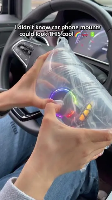 I didn't know car phone mounts could look THIS cool... 🌈🚙 #cargadgets #cartok #caraccessories #rgb #coolgadgets