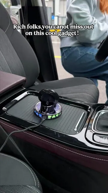 Transform your car interior from 🥱to ❤️with this rainbow phone mount! #AestheticCar #TechHacks #DopamineDecor#wirelesscharger #carmount 