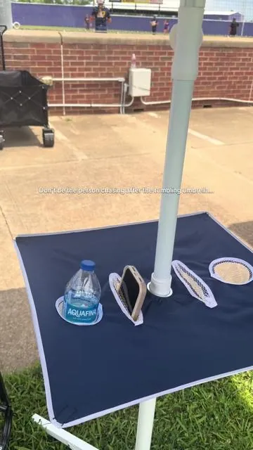 You don’t have to be the person chasing after a tumbling umbrella anymore! This umbrella comes with a stand WITH stakes!! Shade with peace of mind.. you’re welcome!  #travelballlife #baseballmomlife #softballmom #summerhacks #SummerVibes 