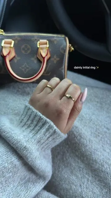 Fortunately, I wear his initial 💖 #initialring #customring #giftideasforher #daintyjewelry #ringstack 