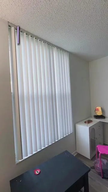 the pringles lip IS a paid actor 😂 BUT i finally found a renter friendly way to hang my curtains without drilling holes into the walls 😭 these adhesive curtain rod holders were way sturdier than i expected #renterfriendly #apartmentfinds #curtainrod #brackets #sseptemmberr 