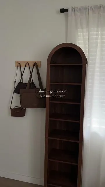 Bookshelf turned aesthetic shoe organizer! ☺️ #shoeshelf #closet #archedshelf #bookshelf #woodenshelf 