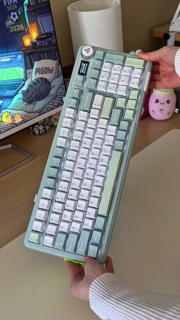 The Solakaka A99 in mint green is so beautiful 🥹🌱 I love how it warms up my desk 😌 sound test with no music at the end 🎧 ⌨️ specs: • 98% layout • tri-mode connectivity (wired / 2.4G / bluetooth) • hot swappable • gasket mount • RGB lighting • knob control • TFT display screen • large capacity battery • compatible with Windows & Mac Thank you @SOLAKAKA Direct for sending me this keyboard 💚 #tiktokshopmemorialday #SummerVibes #solakaka #keyboard #mechanicalkeyboard