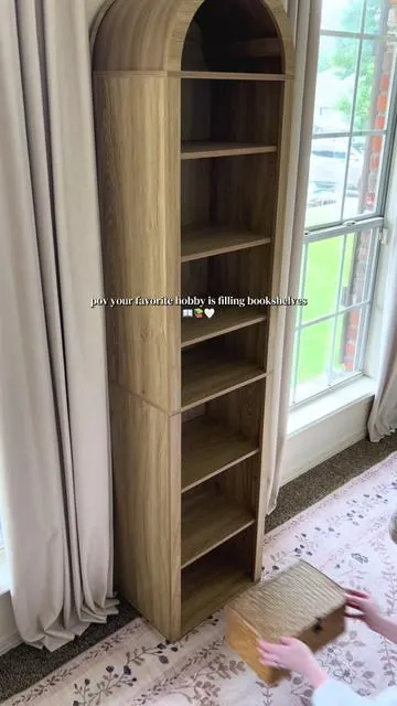 The perfect tall arched bookshelf for any small space 📚🤍 #booktok #archedbookshelf #bookshelfstyling #bookshelfdecor #aestheticbookshelves 