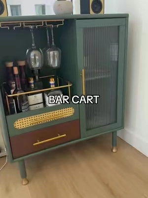 Obsessed with this green for a neutral apartment!!!  #barcart #homedecor #furniture #apartmentfurniture 