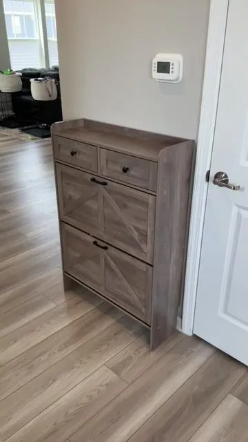 No more entryway clutter with this narrow shoe cabinet, you would never guess all the things you can put in this and remove the eyesore as visitors enter your house.  #entryway #storagehacks #shoerack #showorganizer #homedecorideas 