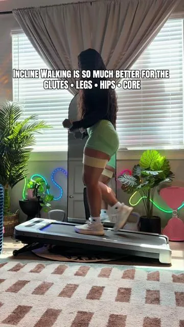 Merach Incline Walking Pad 🔥🔥🔥 Amazing home gym equipment!! It has wheels for easy mobility and Iy fits under my bed!! 👏🏽 it has 12% incline 4.0 speed. It has Bluetooth speakers for your music and a remote control. It’s also super smooth and quiet!!! my favorite walking pad!!!  #walkingpad #inclinewalk #homegym #homeworkout #treadmill 