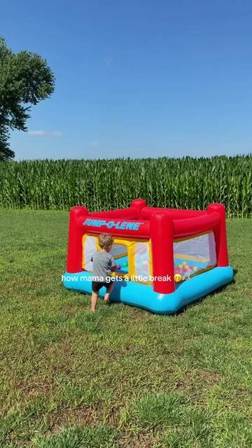 sipping my coffee while he gets the zoomies out 🤭🤣 #bouncehouse #outdoorplay #toddlermom #dealsforyoudays 