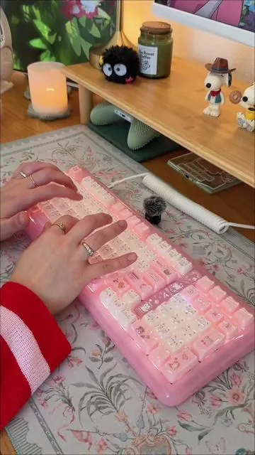 I have been wanting to try a KiiBOOM keyboard for so long and let me tell you they did not disappoint! ✨🩷 Typing on this keyboard feels like a warm hug it’s thocky and almost pillowy in the best way! 🫂  This is perfect for anyone who loves a keyboard with a numpad but also wants wants something with personality 🐾 🐱  Tags keyboard, keyboards, keeb, kiiboom, pink keyboard, aesthetic desk setup, desk inspo, cozy gaming, cozy gaming setup, gaming setup #keyboard #keyboards #cozygaming #cozygamingsetup #cozygameraesthetic