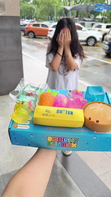 Eight different squishies including a mystery dumpling,rare color-changing strawberry,slow-molding axolotl…..##fidgettoys #squishy #squishybox #squishies #stressrelief 