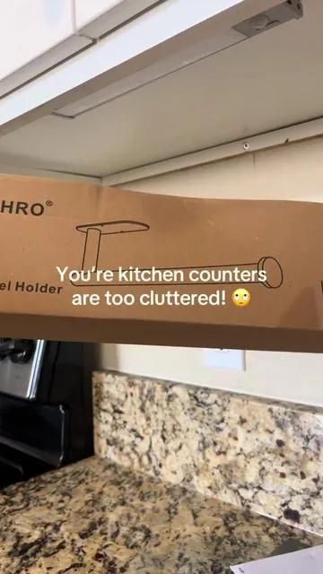 ✨ Counter space is precious, and this under-cabinet paper towel holder just gave me some back. It installs with adhesive strips for a no-drill option, or you can use the included screws for extra security. Simple, sleek, and such a smart kitchen upgrade. 🖤 #orlandoinfluencer #TikTokShopFinds #KitchenOrganization #HomeHacks #KitchenMustHaves 