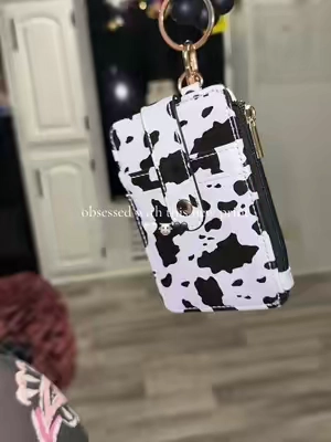 So many gorgeous prints tho #cowprint #wrislet #dealsforyoudays #errands #christmasgiftideasforher 