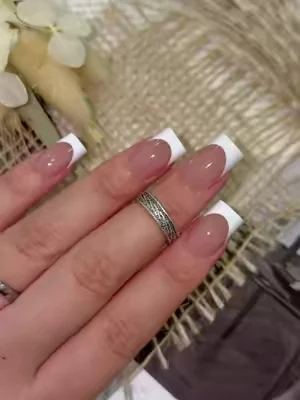 Sheer nude base + slanted French tip creates ultra elegant hand look ✨WM #nails #pressonnails #frenchtipnails #fly #naildesign 