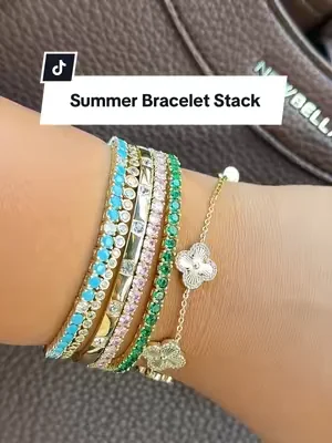 These colorful tennis bracelets from @PAVOI add the perfect pop of color for the summer 🩵💗💚 ☀️ #pavoijewelry #jewelrystack #goldplatedjewelry #SummerVibes #dealsforyoudays  
