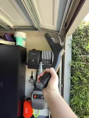 I swear, half the battle with keeping your car clean is just having the right setup. 😅 Once I installed a wall-mounted vacuum with a retractable hose, I stopped making excuses. No dragging a giant Shop-Vac around, no tangled cords, and no hunting for attachments. Just pull the hose out, hit the seats, mats, and trunk, and everything goes right back where it belongs. It makes maintaining a clean interior way too easy. #tiktokshopdealsforyoudays #cardetailing #carcare #garagegear #tiktokshopfinds