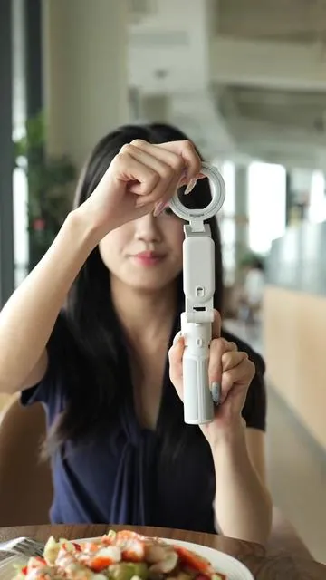 Camera grip + selfie stick + tripod—all in one. This little gadget is the only thing you need to bring when you head out. One device does the job of three, and the best part? It's magnetic, so you can snap on a fill light and level up your shots in seconds. #SelfieGadget #BluetoothRemoteControl #Tripod #selfiestick#DealsForYouDays 