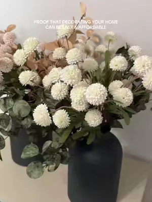 One of my favorite budget-friendly home decor finds 🤎 #artificialflowers #homedecor #shelfdecor #tabledecor #interiordesign 