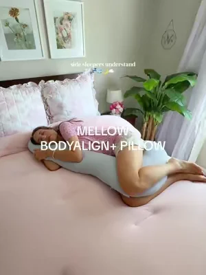 it’s bigger and cooling?! i’m 5’8” btw for size reference 😊 @Mellow Sleep  #sidesleeper #bodypillow #mellowsleep #sleeptok #dealsforyoudays 