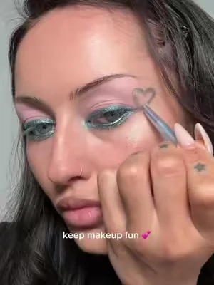 @Frankie Darling makes color feel impossibly chic. 💘 💞 #KaleidosEyeliners in Sea Sparkle + Aurora Runner 💞 #SpaceAgeHighlighter in Gifted 💞 #GlassloadLipMelt in Cheat Code #girlymakeup #funmakeup 
