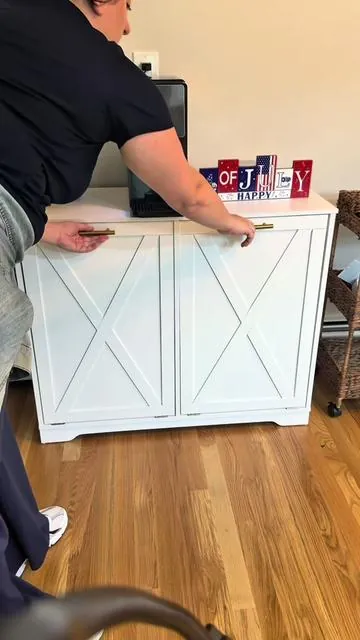 Trash bin hiding cabinets with odor control and additional counter space. I love mine, looks kind of farmhouse to me. You can swap out the handles with silver ones if wanted. Odor control is great when disposing smelly foods. #trashcabinet #lifehack #kitchenhacks #kitchenessentials 