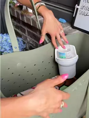 I thought my Crocs tote was almost complete until I found this cup holder attachment. #totebag #toteaccessories #summermusthaves #crocstote @Crocs 