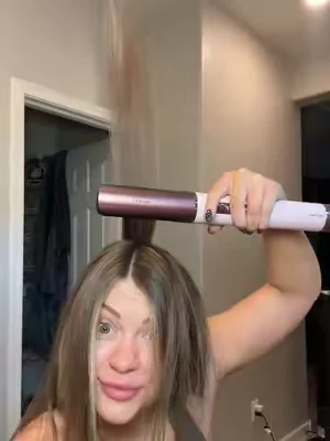 This is my Dreame Airstyle Era and I am in love with the straightening attachment. My hair feels so soft and shiny. #airwrap #airstyle #hair #dealsforyoudays #hairtutorial 