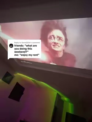 Replying to @XenoQ33n enjoying my rent never felt better 🤷‍♂️ #roomfinds #projector #movienight #trending #harrypotter 
